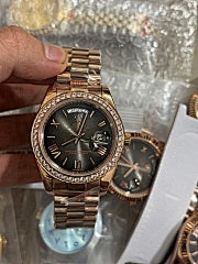 Rolex Day-Date Rose Gold with Diamond Bezel